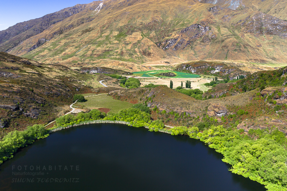 See von oben in Berglandschaft